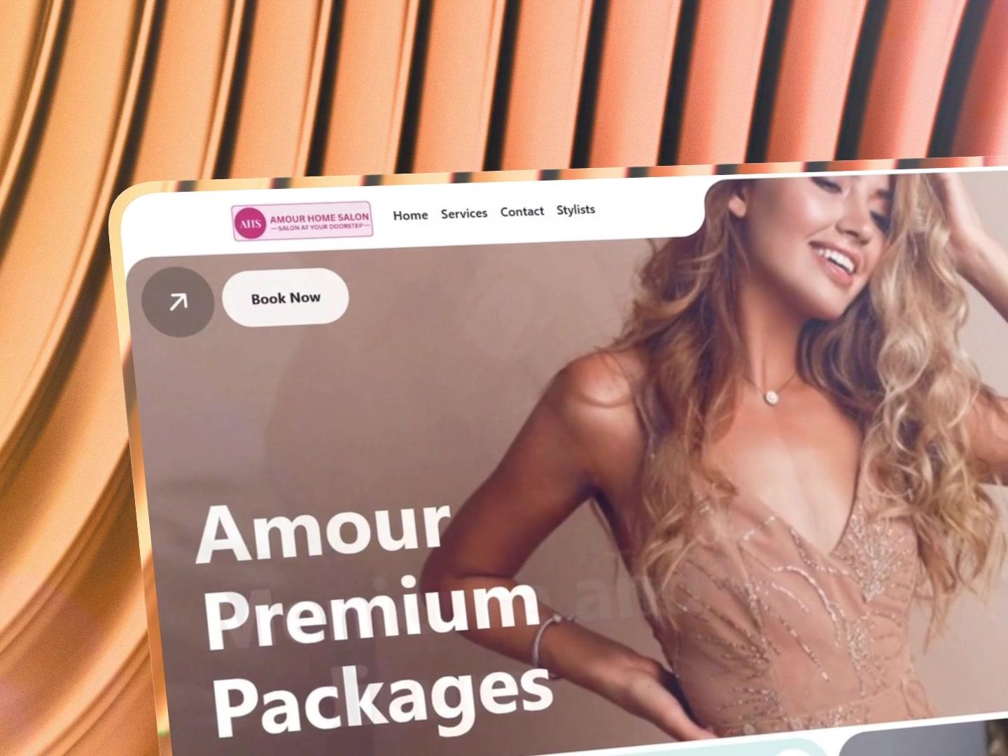 Amour Home Salon's home page in a glass frame on copper ribbed glass: the Amour Premium Packages hero