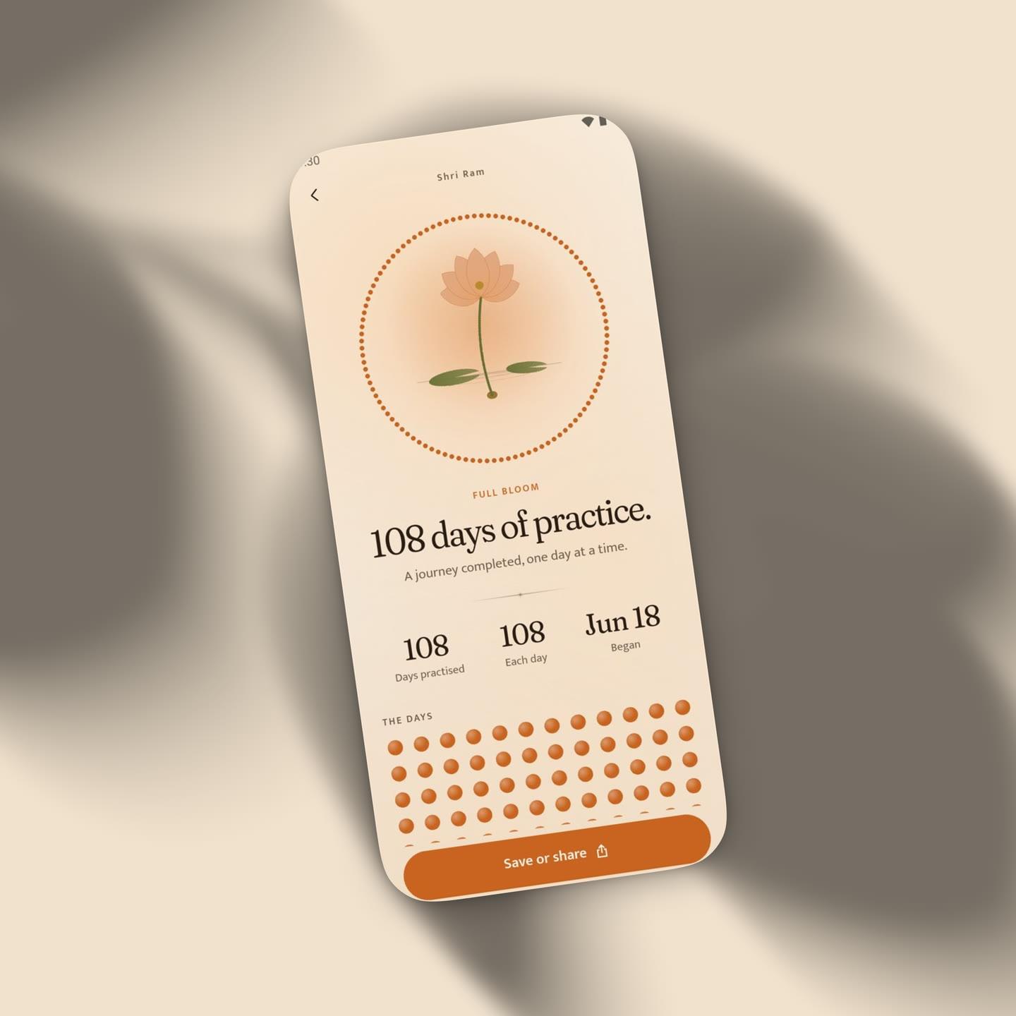 Japa's journey screen, a lotus in full bloom after 108 days, on a sand ground in leaf shadows